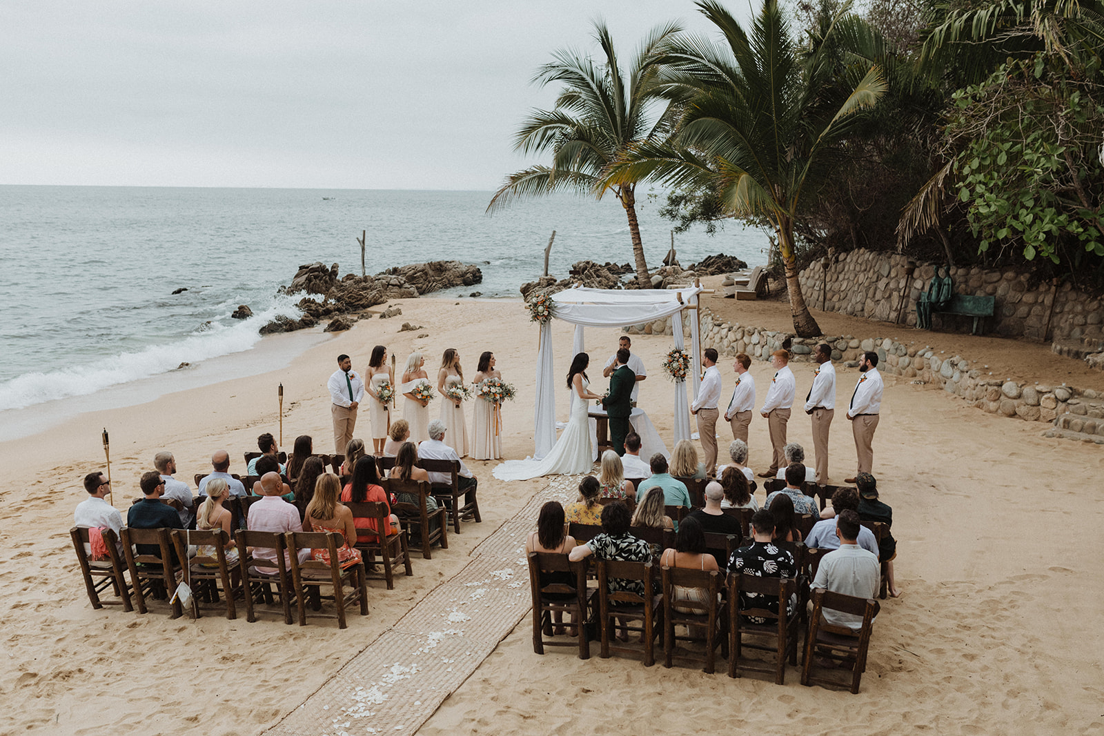 Destination Elopement Guide: Wedding ceremony by the beach, captured by Alexa Ann Photography