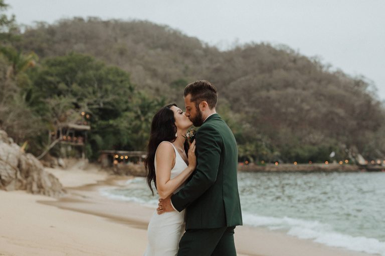 Best Wedding Venues to Elope in Mexico: Bride and groom sharing a kiss during their Mexico elopement, taken by Alexa Ann Photography