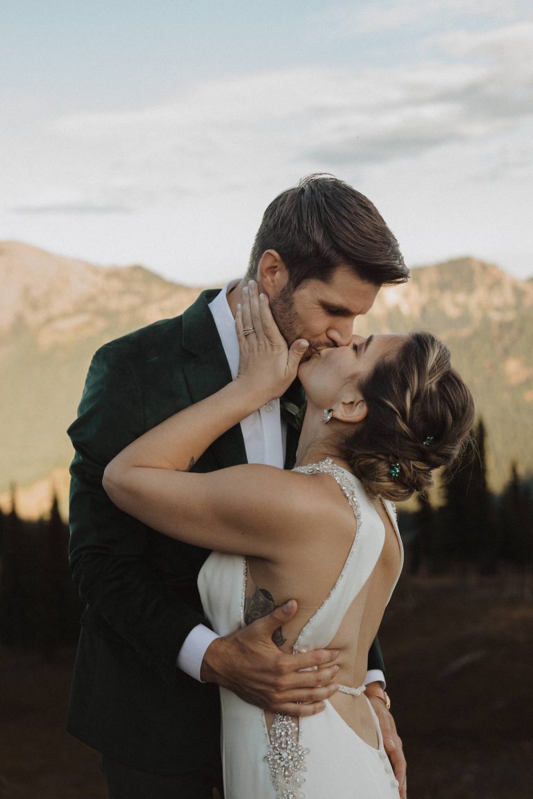 Bride and groom sharing a kiss during their wedding shoot with Alexa Ann at Crystal Sky Camp