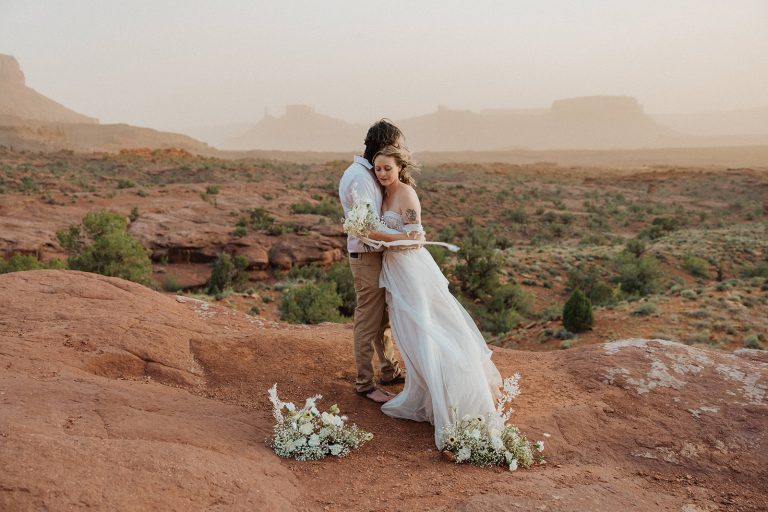 Bride and groom sharing an embrace during their destination elopement shoot with Alexa Ann Photography