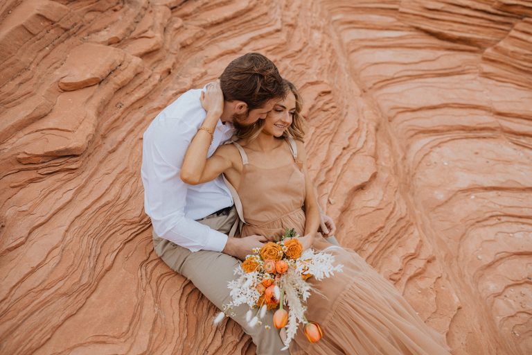 Couple sharing an embrace at their Bryce Canyon National Park elopement shoot with Alexa Ann Photography